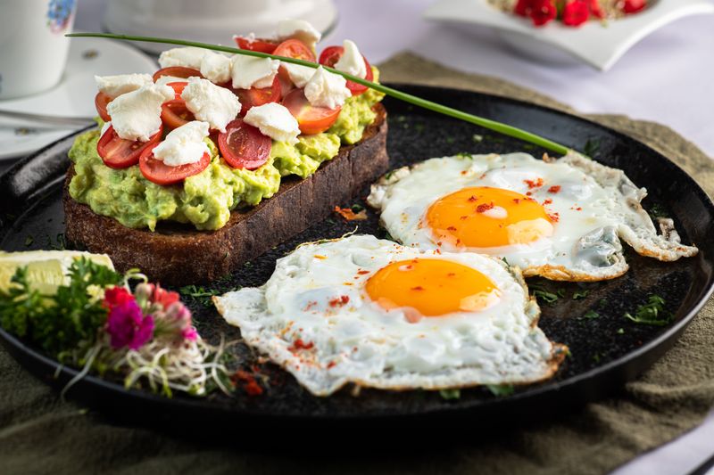 Avocado toast with poached eggs on sourdough at Tatte